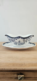 Saucière ancienne en faïence fine probablement Lunéville – décor bleu et blanc avec dormant