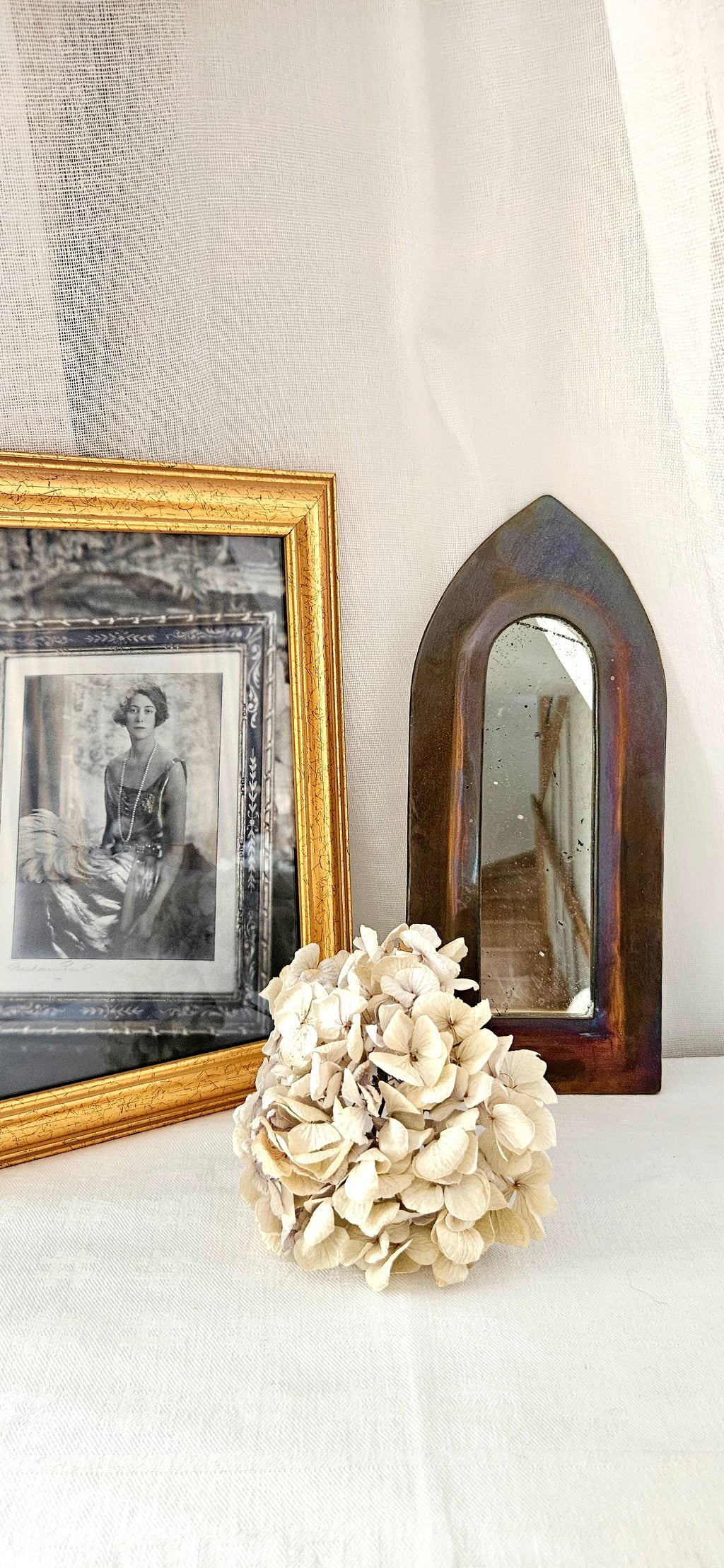 Petit miroir ancien forme arche - laiton