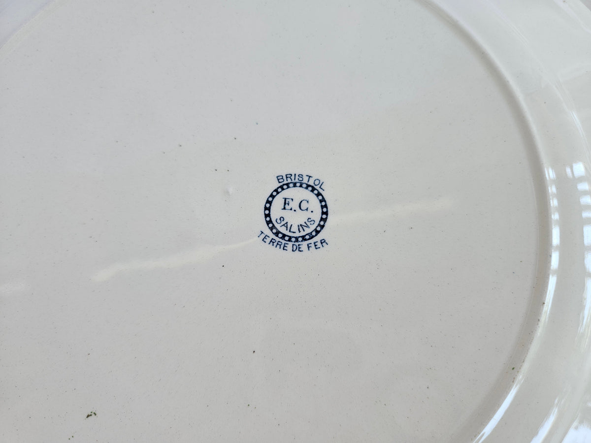 Grand plat rond ancien E.C. Salins Bristol | Terre de fer française